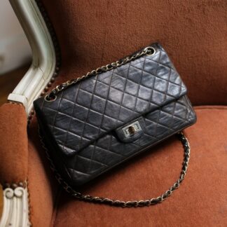 Chanel sac à main modèle 2.55 vintage à double rabat en cuir marron