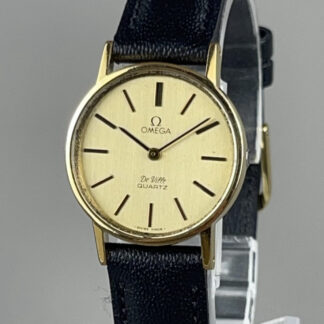 Montre vintage femme OMEGA De Ville 1351 or pile neuve bracelet cuir neuf