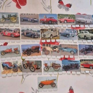 Lot 29 plaques publicitaires L'Auto à travers les âges offert par Coop années 60