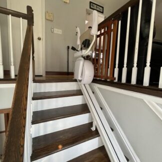 stair lift  new rail 15ft comes with chair , motor and 2 remotes