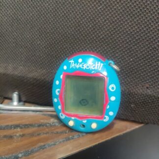 Tamagotchi - bleu transparent - Bandai 2004 Tamagotchi Fonctionnel