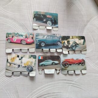 Lot 7 plaques publicitaires L'Auto à travers les âges offert par Coop années 60