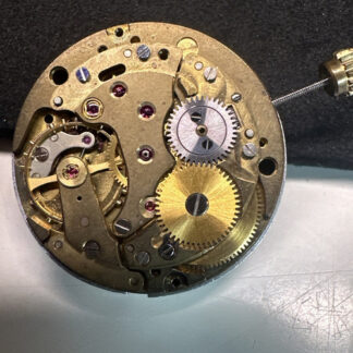 Rolex Cal1570 automatic w/mean plate w/many other parts to complete or for Parts